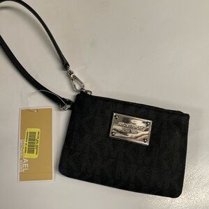 NWT.  Micheal Kors wristlet.